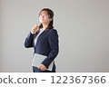 A businesswoman holding a tablet and feeling full of hope_1 122367366