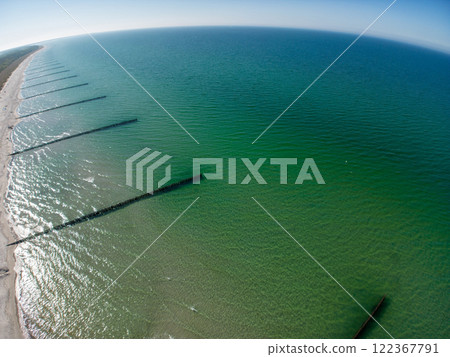 Groynes on the beach at Zingst, Mecklenburg-West Pomerania, Germany Groynes on the beach at Zingst, Mecklenburg-West Pomerania, Germany 122367791