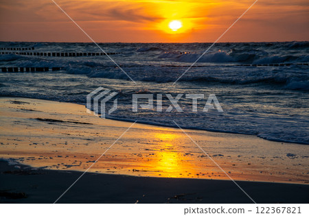 Sunset at Zingst Beach, Darss, Germany Sunset at Zingst Beach, Darss, Germany 122367821