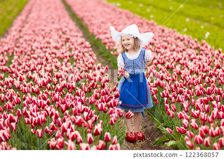 Dutch children in tulip field 122368057