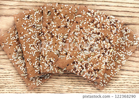 Colorful mix of crispbread varieties. Food snacks for healthy diet background. 122368290