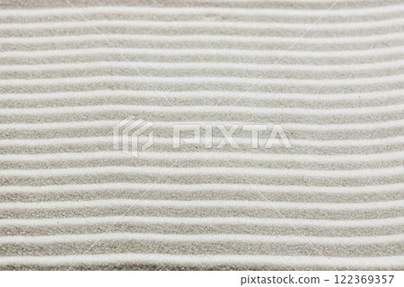 Background pattern of raked white sand 122369357