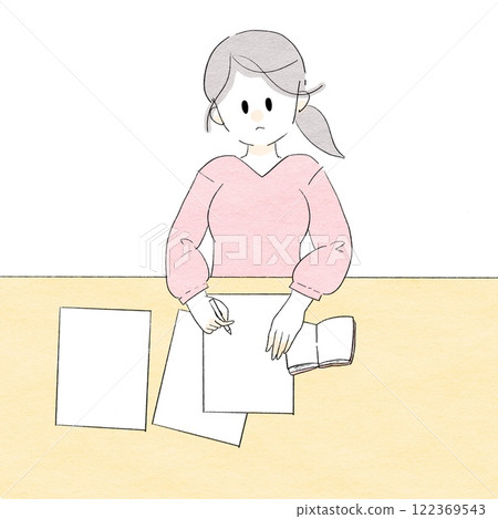 A woman adjusting her schedule by looking at her notebook and printouts 122369543