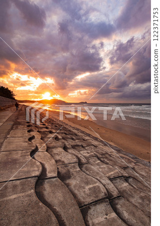 Sunset view from the coast 122371753