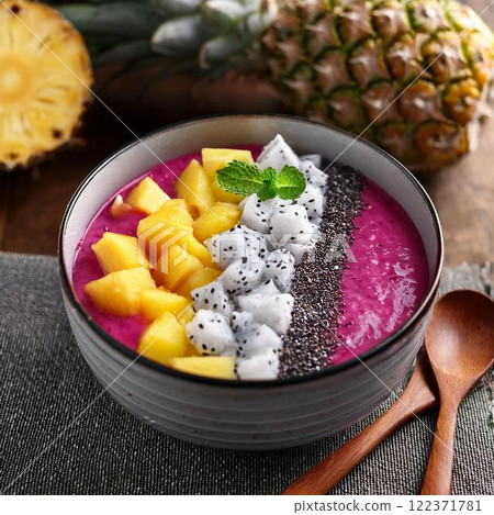 Delicious dragon fruit and pineapple smoothie bowl 122371781