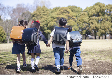 Five first-year students commuting to school 122373865