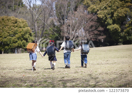 Five first-year students commuting to school 122373870