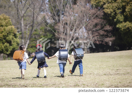 Five first-year students commuting to school 122373874