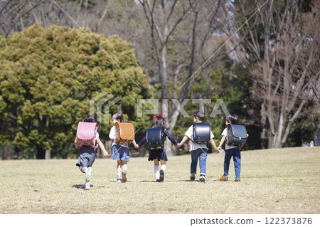 Five first-year students commuting to school 122373876