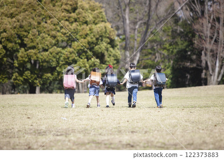 Five first-year students commuting to school Five first-year students commuting to school 122373883