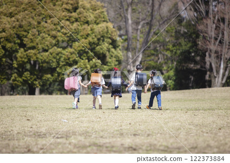 Five first-year students commuting to school 122373884