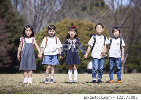 Five first-year students commuting to school 122373898