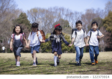 Five first-year students commuting to school 122373914
