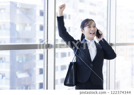 Job hunting, smartphone, happy woman talking on the phone Job hunting, smartphone, happy woman talking on the phone 122374344