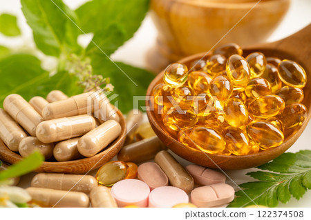 Alternative medicine herbal organic capsule, mineral, drug with herbs leaf natural supplements for healthy good life. Alternative medicine herbal organic capsule, mineral, drug with herbs leaf natural supplements for healthy good life. 122374508