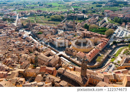 Aerial view of Tarazona on Queiles river with bullring and bell tower of Santa Maria Magdalena 122374673
