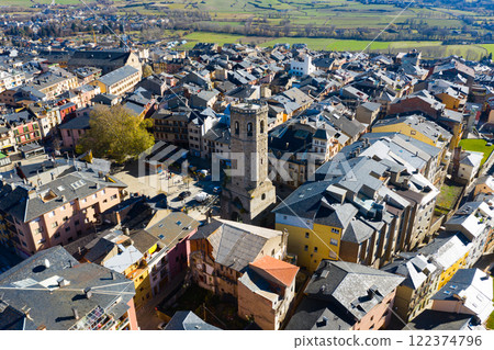 Aerial view of Spanish town of Puigcerda with medieval church belfry 122374796
