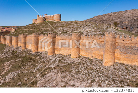 Berlanga de Duero medieval castle ruin near Soria, in the Castilla Leon region Spain with blue sky from air 122374835