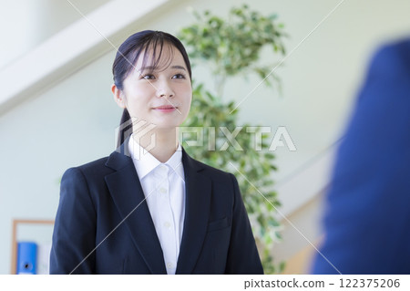 Job hunting: Woman undergoing an interview 122375206