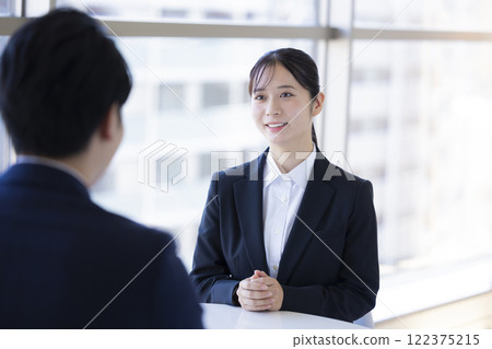 Job hunting: Woman undergoing an interview Job hunting: Woman undergoing an interview 122375215