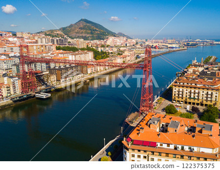 Aerial view of Vizcaya bridge over the river, cityscape at Portugalete 122375375