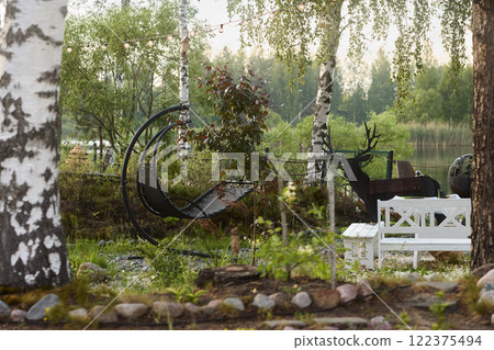 A Serene Outdoor Scene Featuring Rustic Decor that Highlights the Natural Beauty Around Us A Serene Outdoor Scene Featuring Rustic Decor that Highlights the Natural Beauty Around Us 122375494