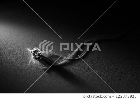 Minimalist Close-Up of a Diamond Necklace 122375923