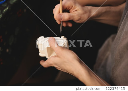 Exploring the world of Artisan Crafting Making beautiful paintings on ceramic items Exploring the world of Artisan Crafting Making beautiful paintings on ceramic items 122376415