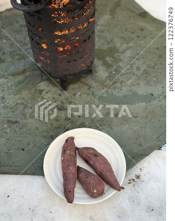 Baked sweet potato in the snow 122376749