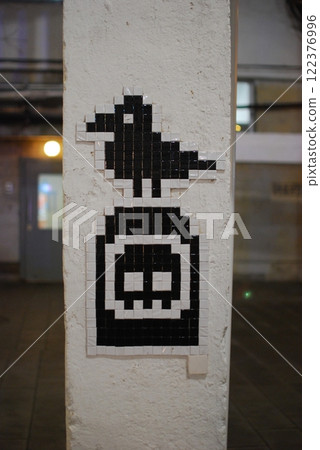 A Unique Pixel Art Mosaic Creating a Striking Contrast on an Urban Wall for All to See A Unique Pixel Art Mosaic Creating a Striking Contrast on an Urban Wall for All to See 122376996