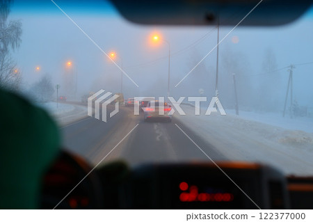 A Foggy Winter Drive Engaging Evening Commute in Challenging Snowy Conditions Ahead A Foggy Winter Drive Engaging Evening Commute in Challenging Snowy Conditions Ahead 122377000