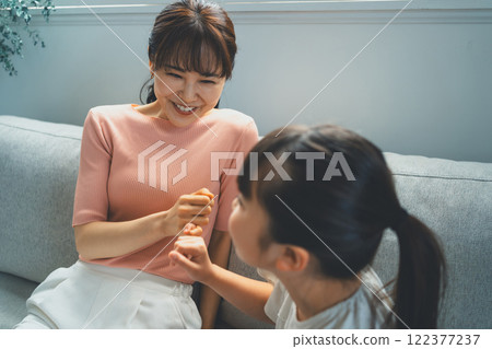 Mom and her 9 year old daughter 122377237