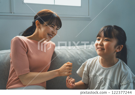 Mom and her 9 year old daughter Mom and her 9 year old daughter 122377244