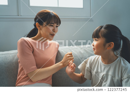 Mom and her 9 year old daughter Mom and her 9 year old daughter 122377245