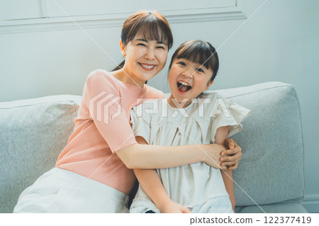 Mom and her 9 year old daughter Mom and her 9 year old daughter 122377419