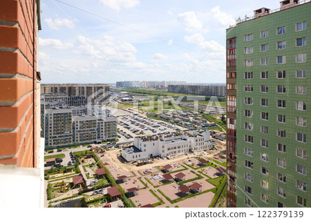 Urban View from High Rise Apartment with Impressive Cityscape and Scenic Horizon 122379139