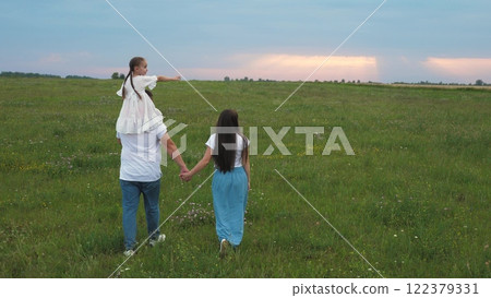 happy family, father mother child kid park, child kid with parents nature, childhood open air, childhood dream, father mother holding hands, father carrying playful little girl daughter shoulders 122379331