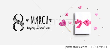 Happy Womens day message with a gift box and hearts Happy Womens day message with a gift box and hearts 122379511