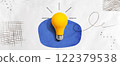 Yellow light bulb with handwritten sketch 122379538