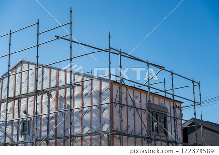 Construction site scaffolding Construction site scaffolding 122379589