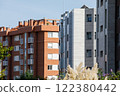 Overview of buildings with individual dwellings for private use in a city. 122380442