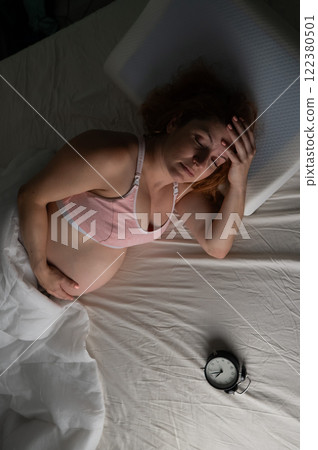 Pregnant woman suffers from insomnia.  122380501