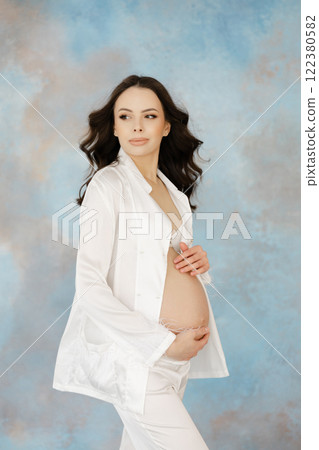 Expectant Mother Embracing Pregnancy Journey Expectant Mother Embracing Pregnancy Journey 122380582