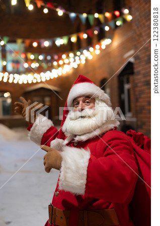 Portrait of Santa Claus in the dark with lights.  122380818