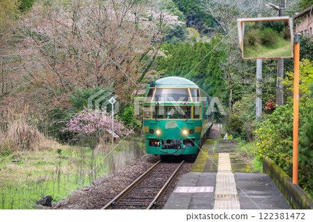 Yufuin No Mori train on railway to Oita and Beppu at springtime, Hita Yufuin No Mori train on railway to Oita and Beppu at springtime, Hita 122381472