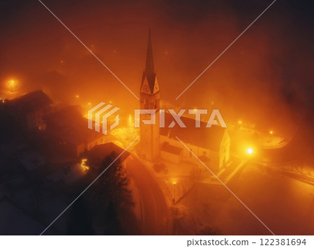 Aerial drone view of the San Lorenzo Church illuminated at night Aerial drone view of the San Lorenzo Church illuminated at night 122381694