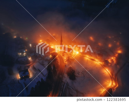 Aerial drone view of the San Lorenzo Church illuminated at night Aerial drone view of the San Lorenzo Church illuminated at night 122381695