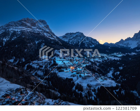 Aerial drone view of the Selva di Cadore comune illuminated at night 122381709