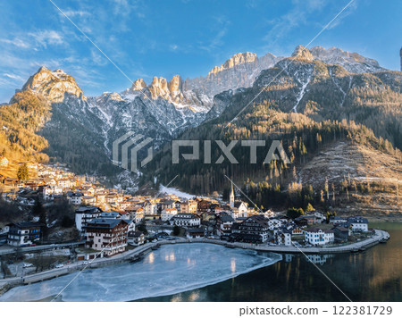 Aerial drone view of the Alleghe village, Italy in daylight 122381729