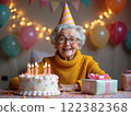 Celebrating a joyful birthday with cake and gifts in a festive setting filled with balloons and decorations 122382368